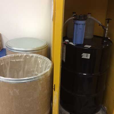 Acrylic monomer and polymer stored safely in fireproof cabinets.